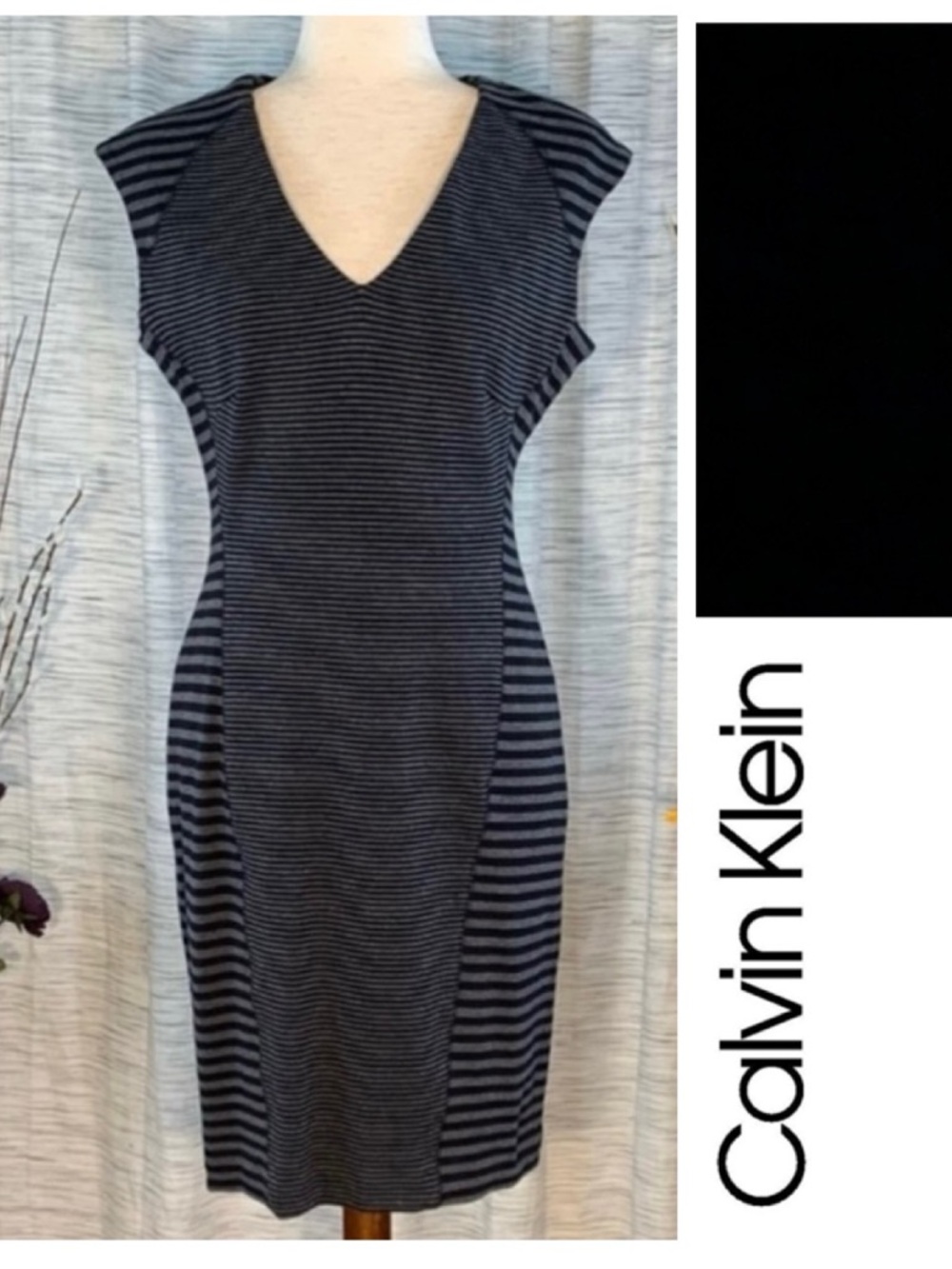 Calvin Klein black and gray striped jersey sleeveless dress.